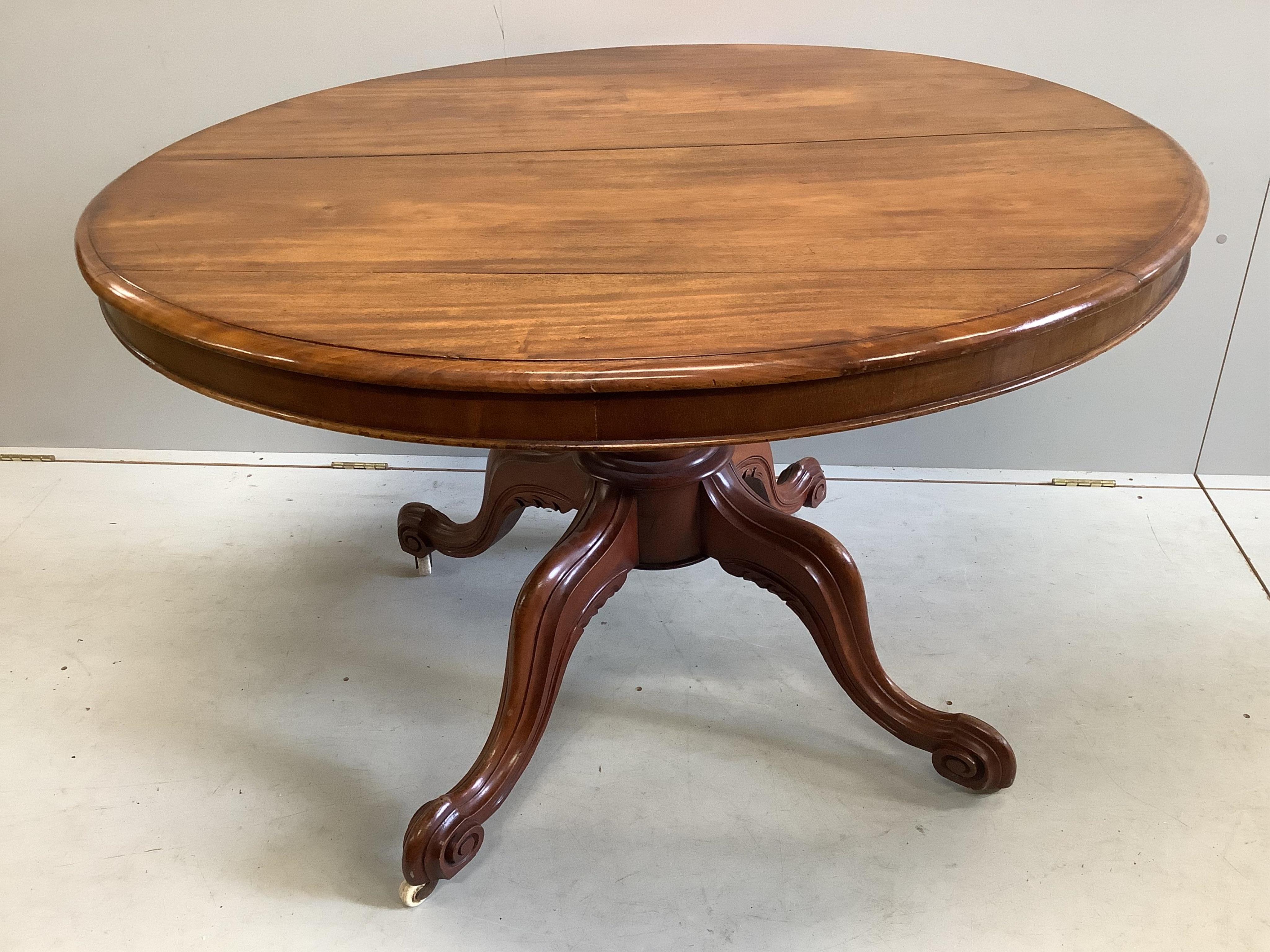 A Victorian circular mahogany tilt top breakfast table, diameter 118cm, height 77cm together with a harlequin set of six William IV mahogany and simulated rosewood dining chairs. Condition - fair
